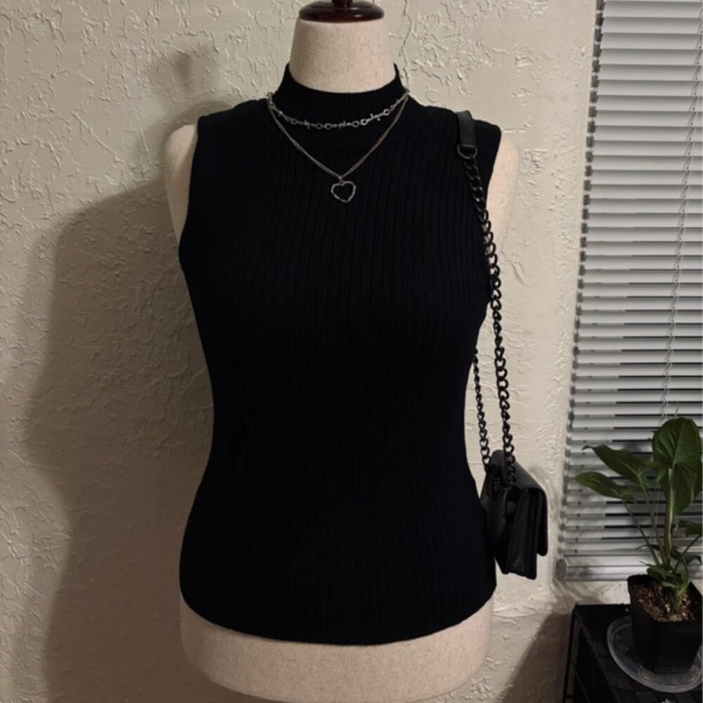Black ribbed knit top with turtle neck